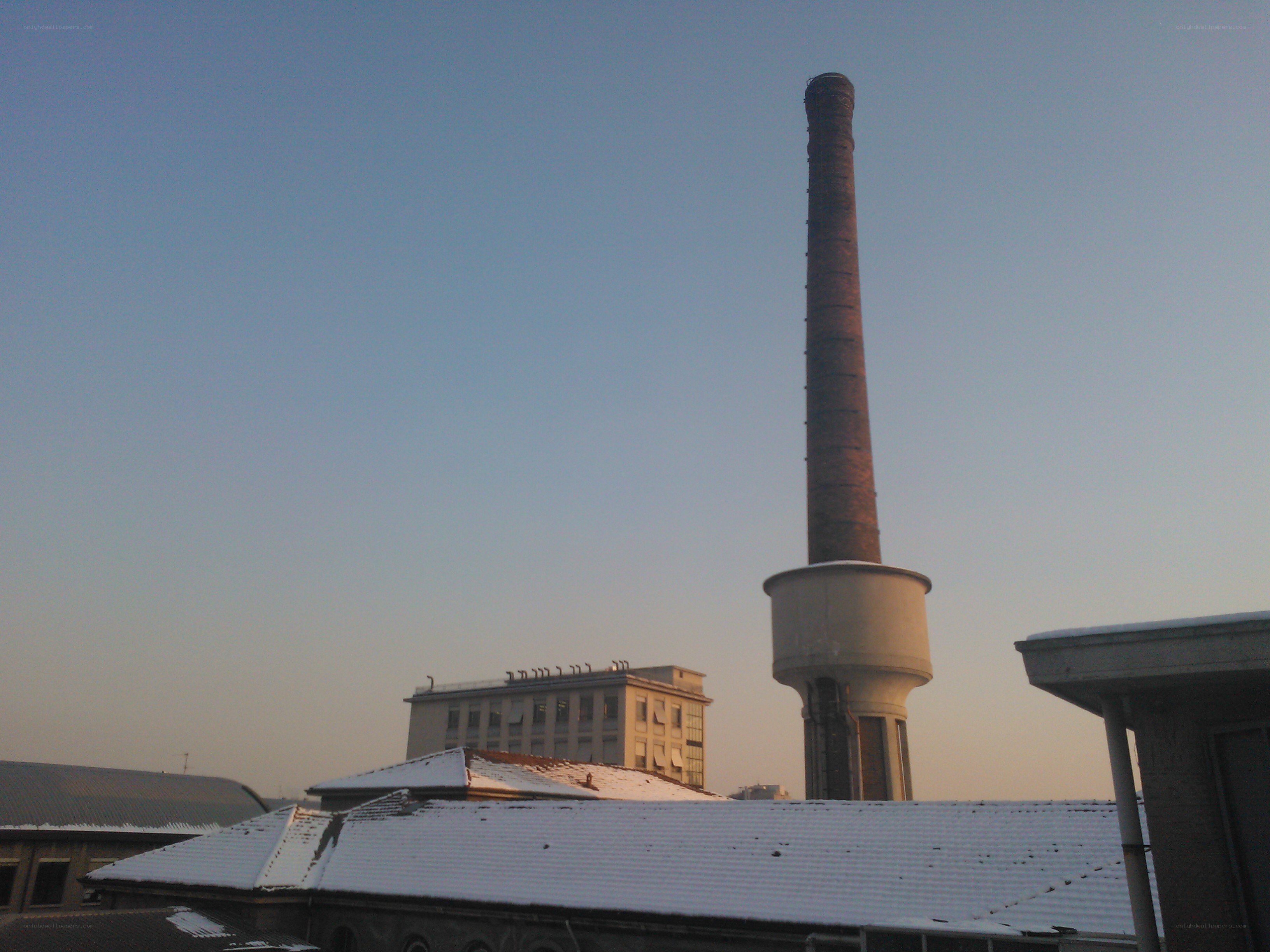 Factory chimney in winter