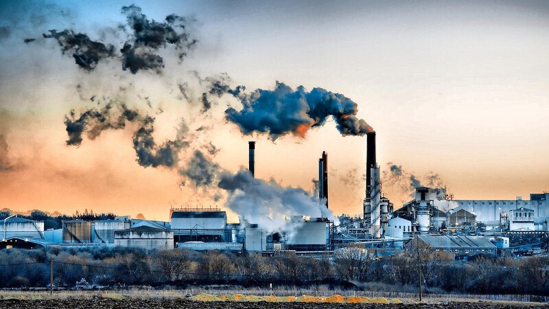 Factory emissions at sunset