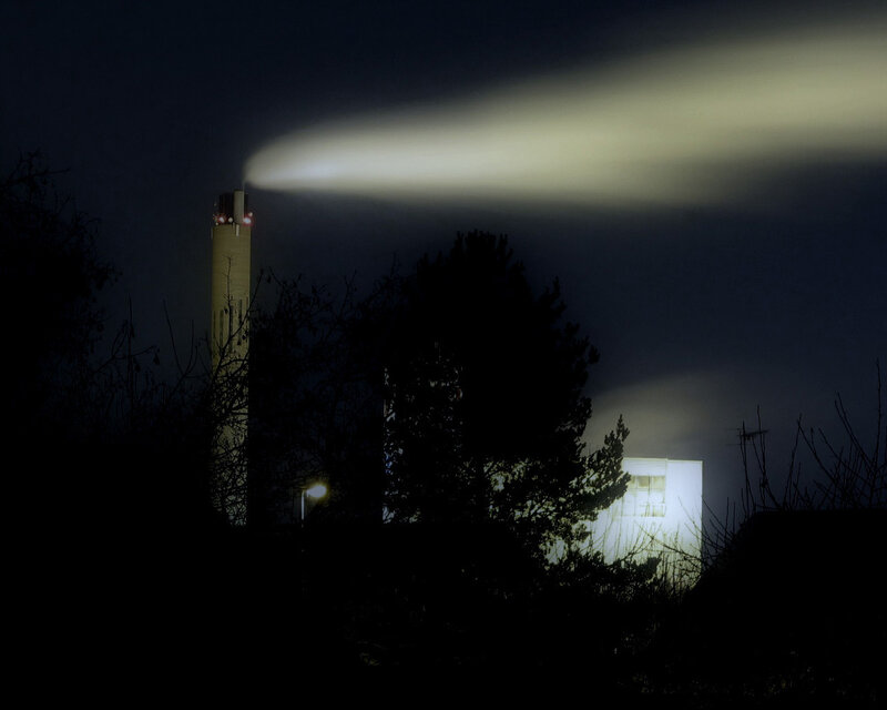 Factory smoke at night