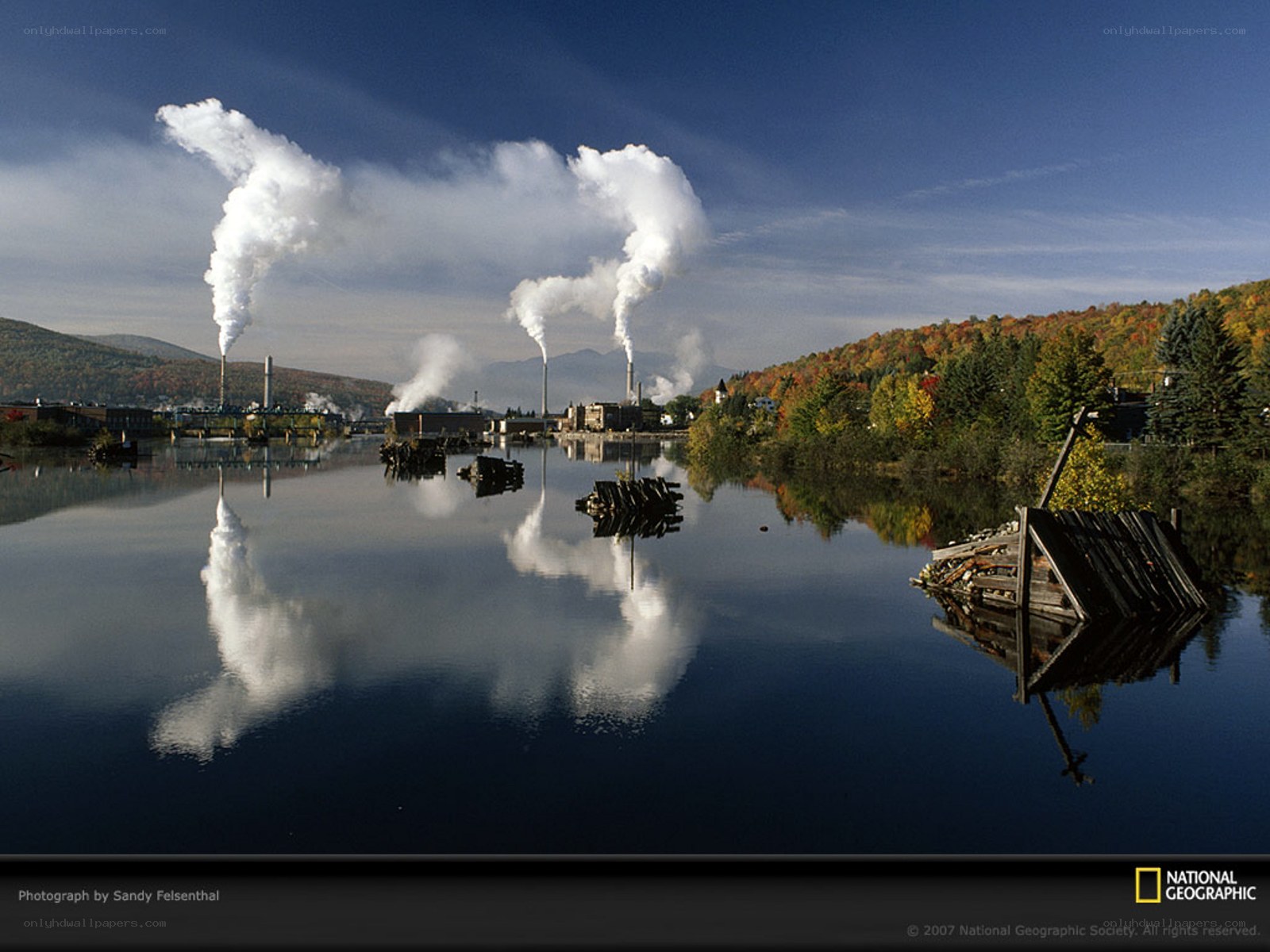 Factory smoke over a river