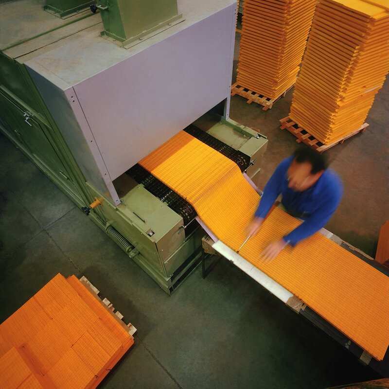 Factory worker handling materials