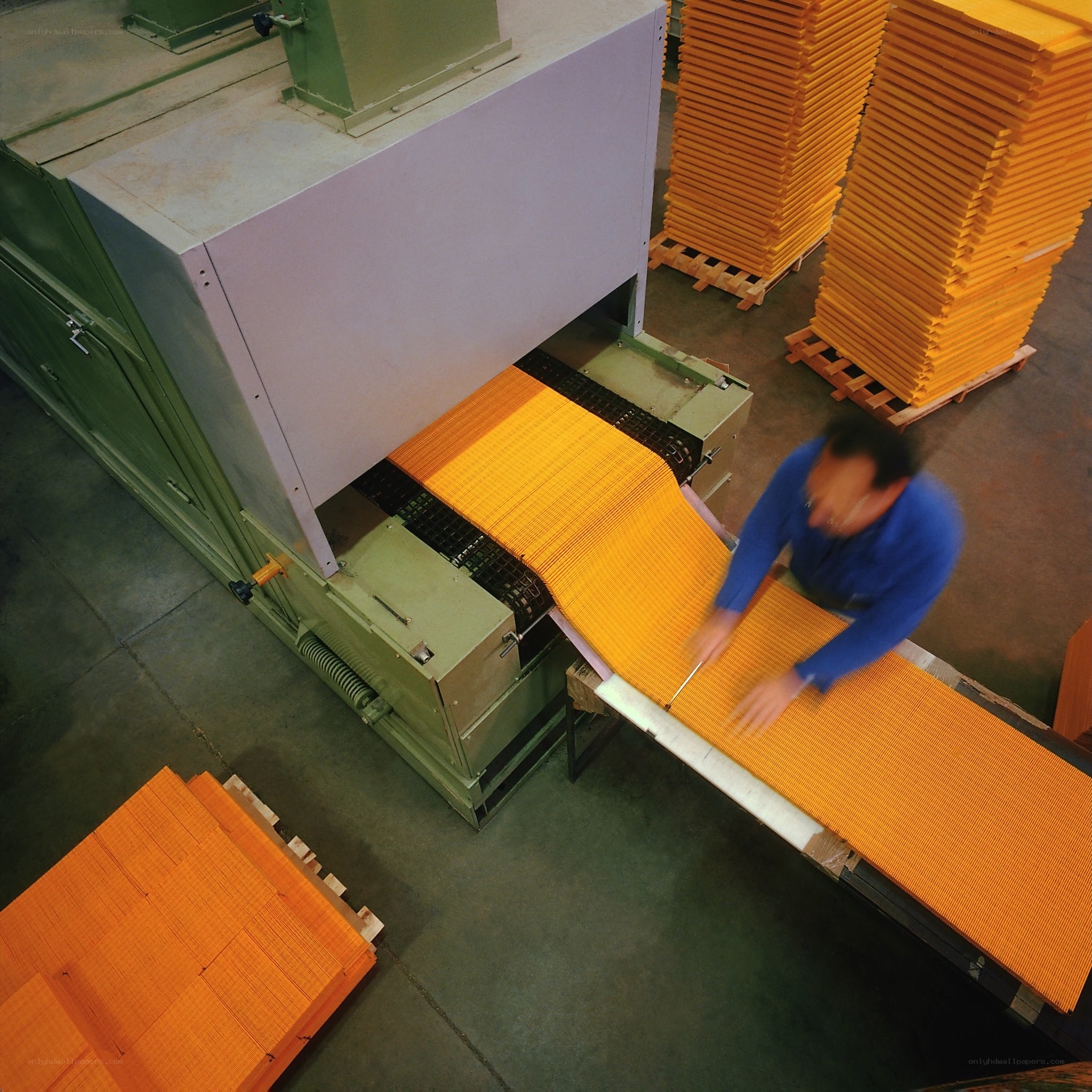 Factory worker handling materials