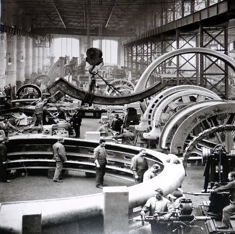 Factory workers at a machine shop