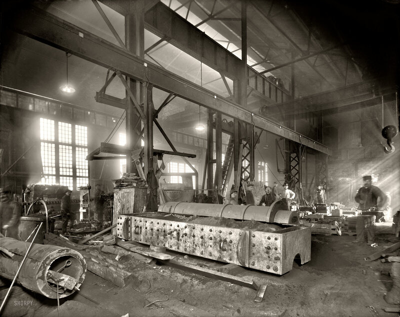 Factory workers at a machine shop