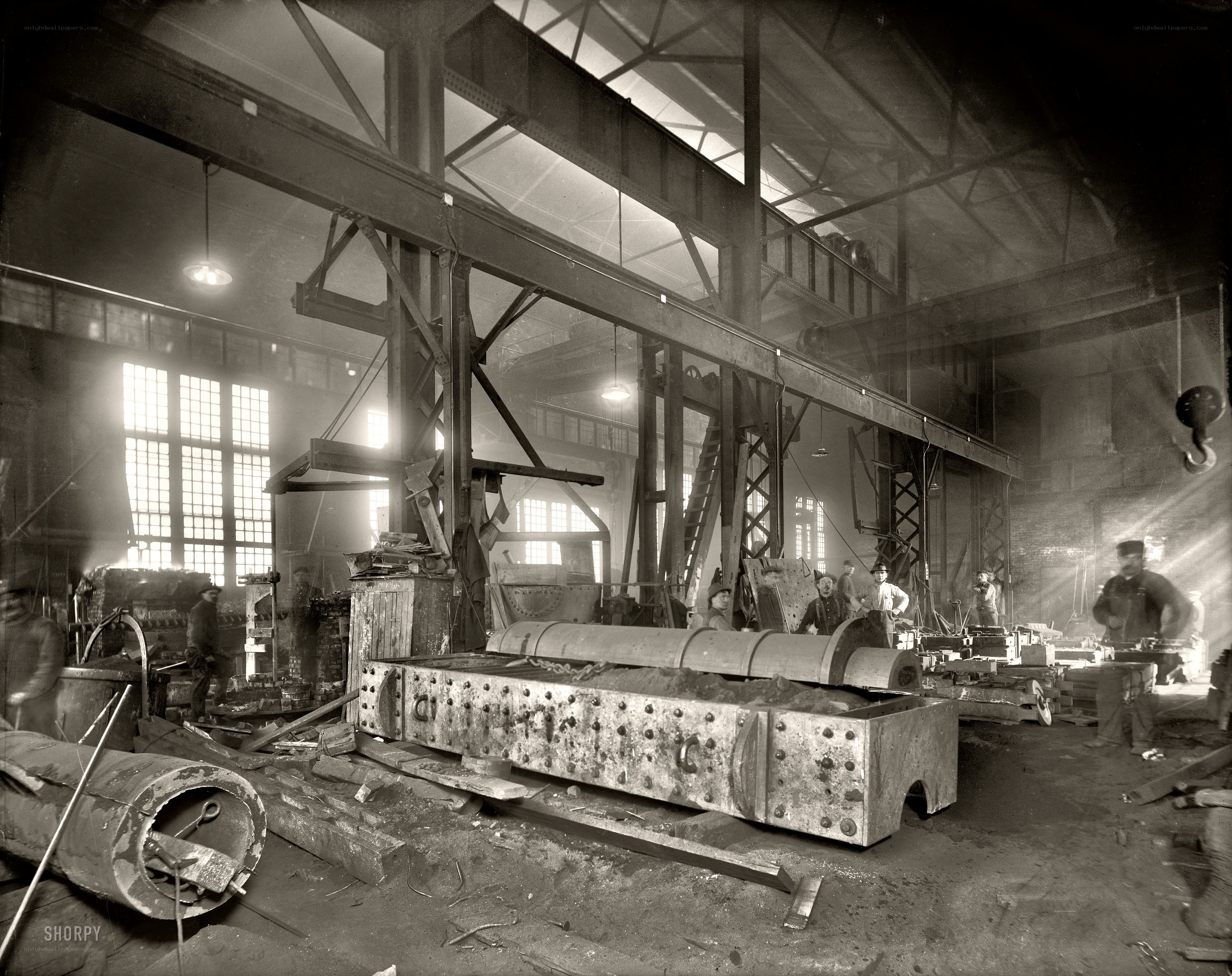 Factory workers at a machine shop