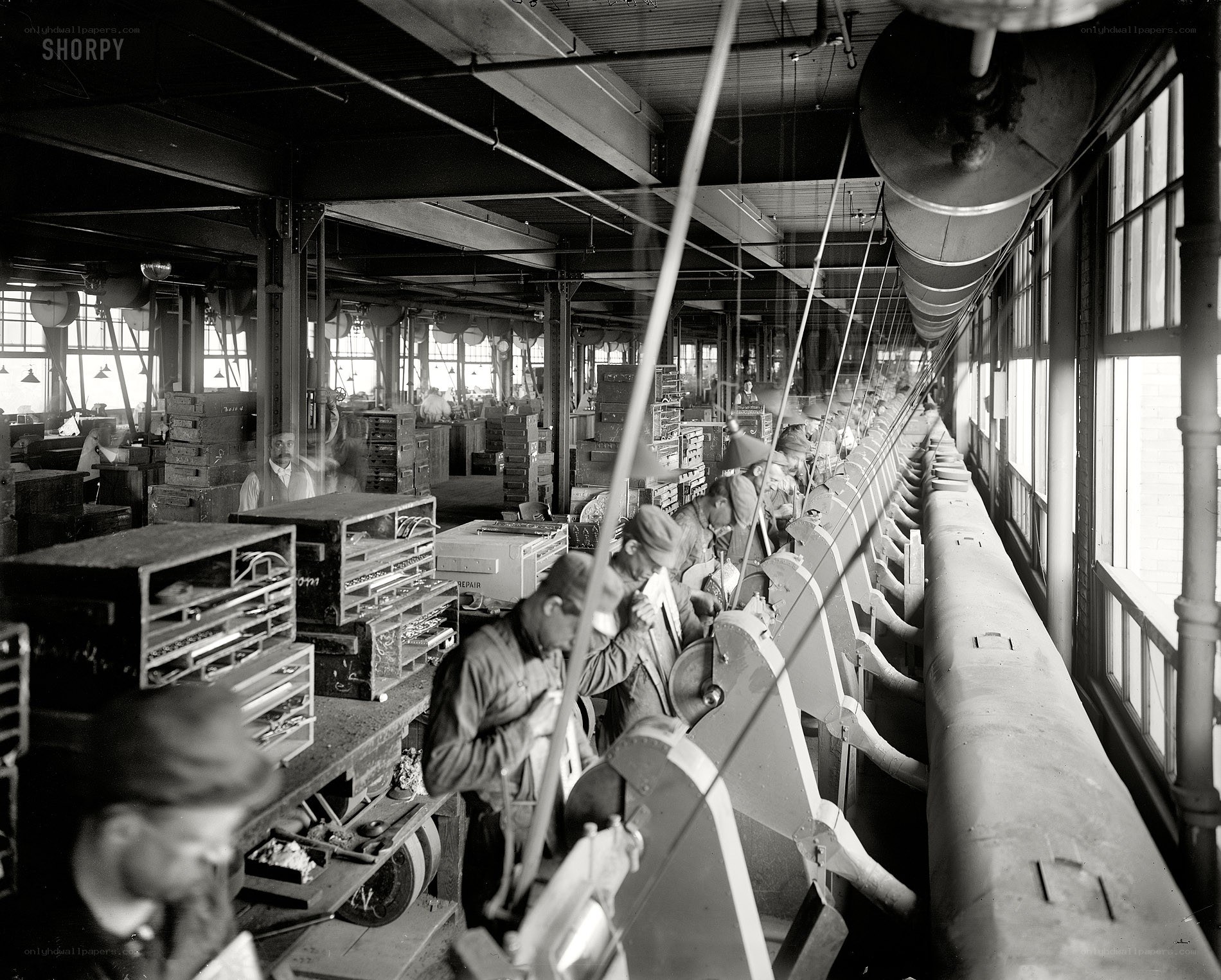 Factory workers at machines