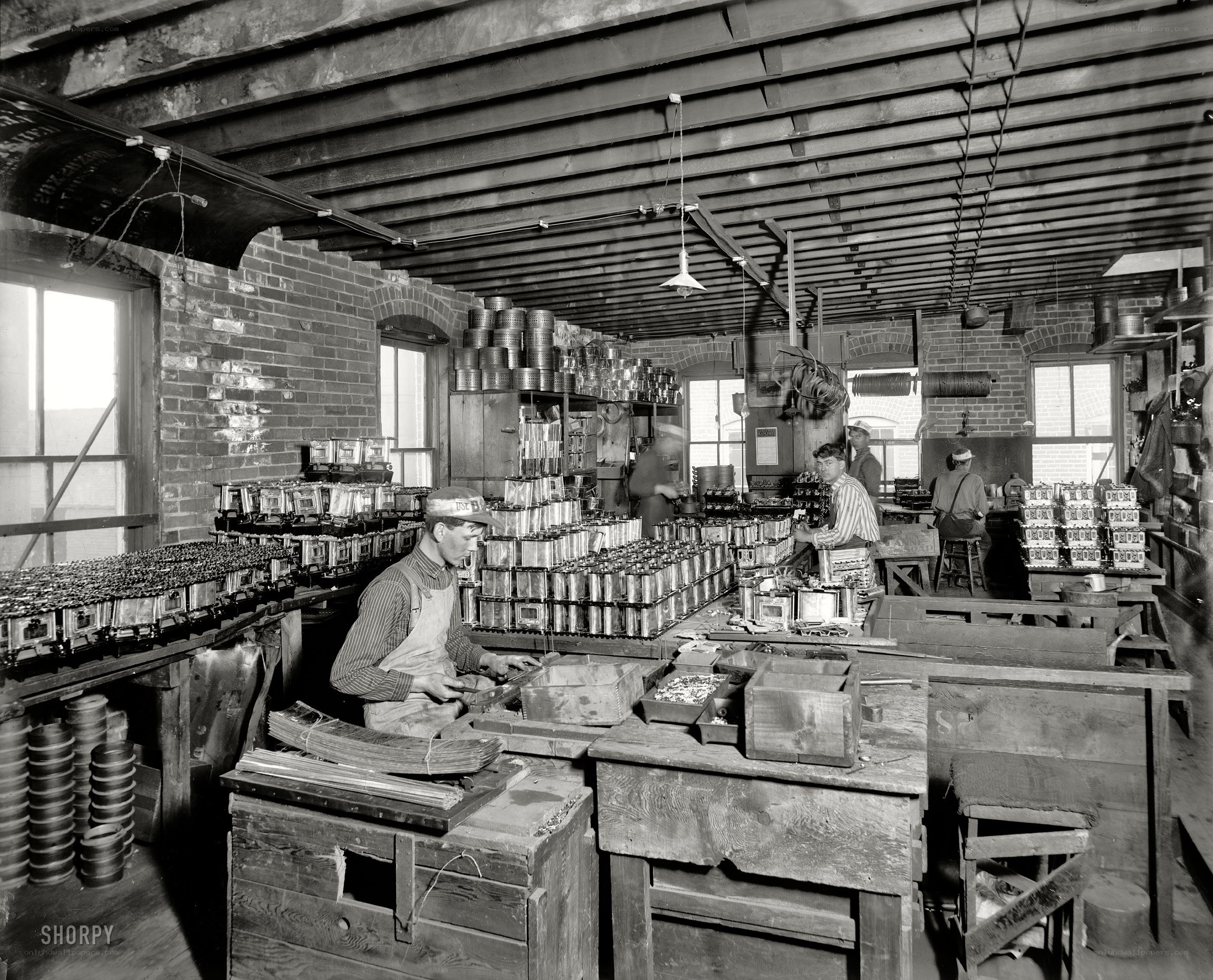 Factory workers at their stations