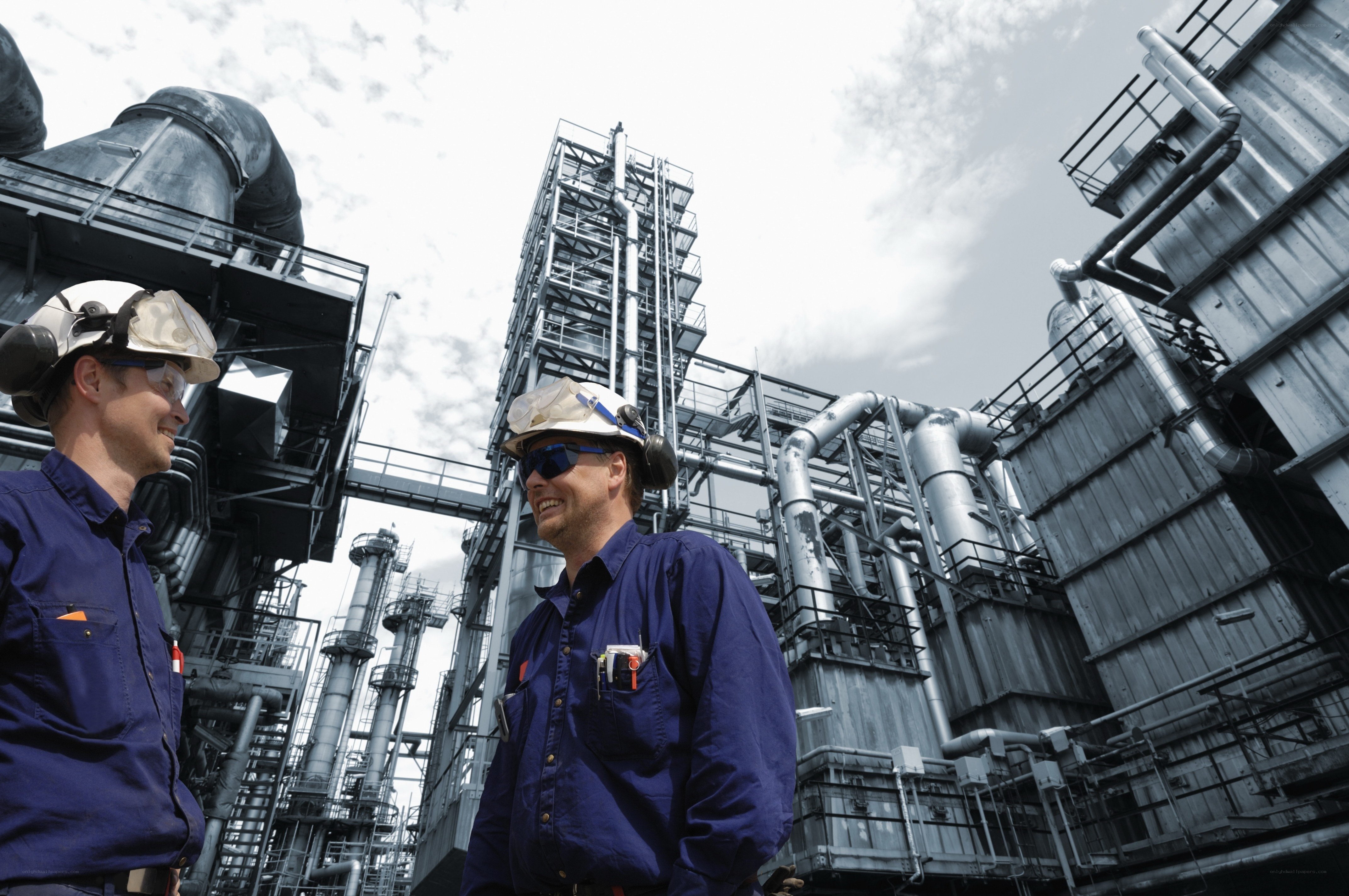 Factory workers in conversation