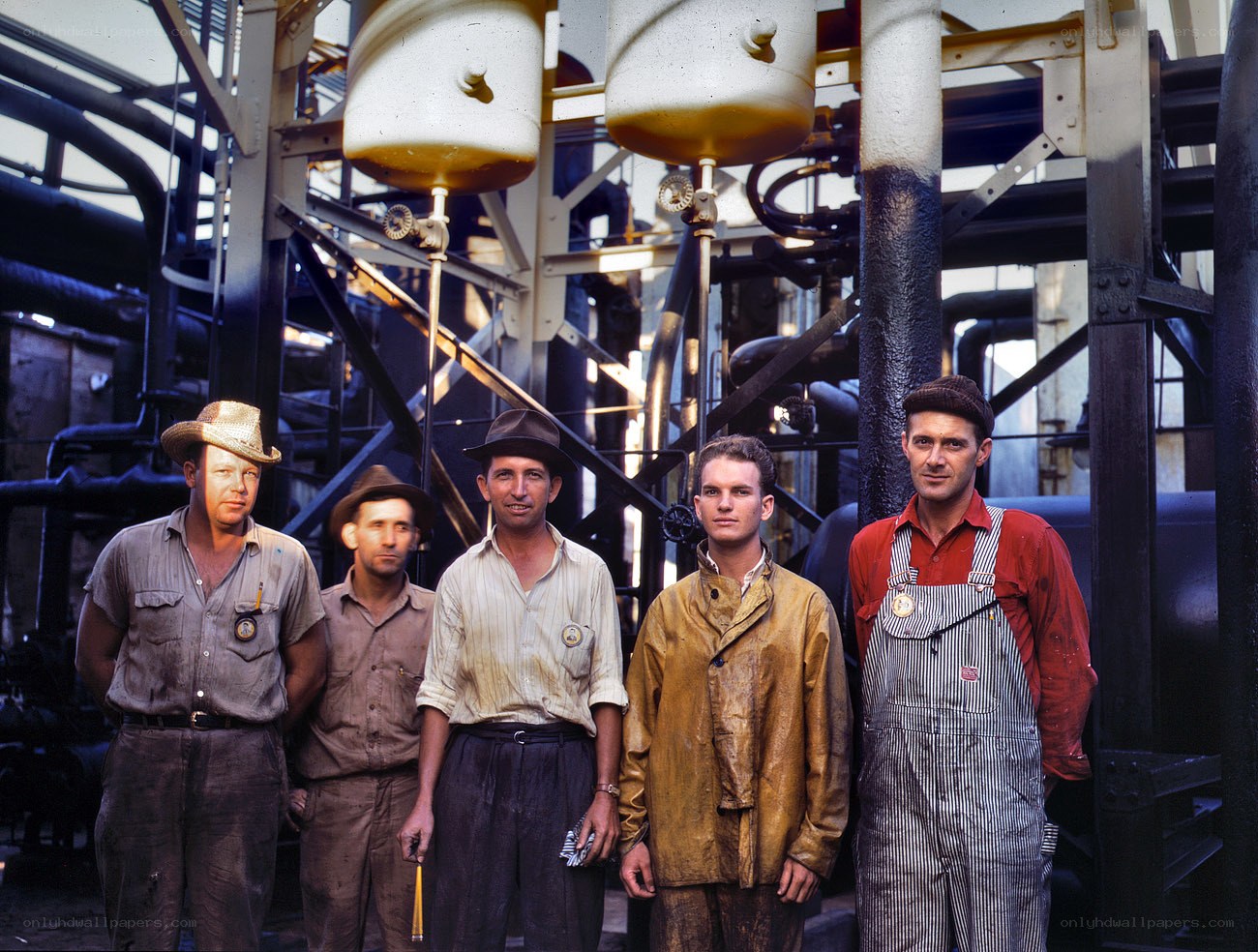 Factory workers in industrial setting