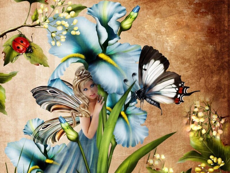 fairy among blue flowers