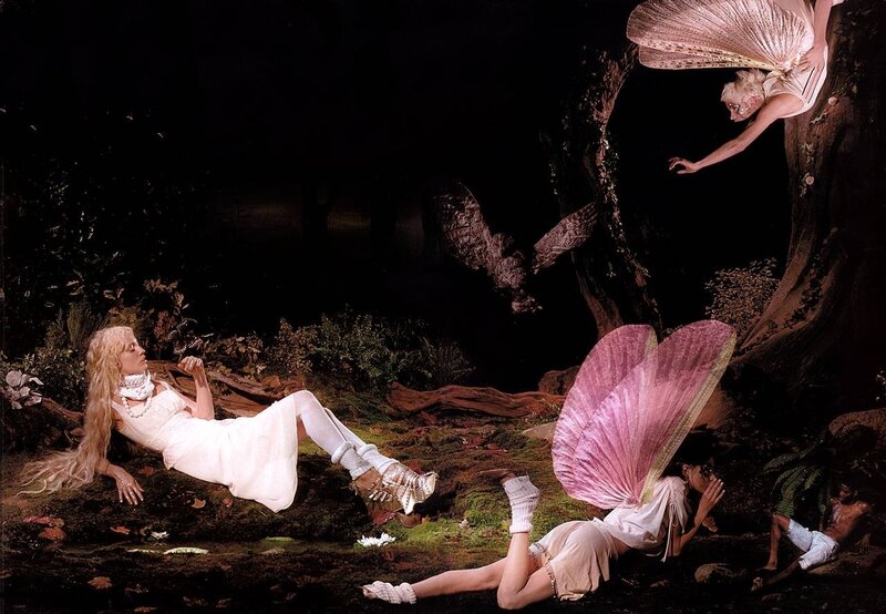 Fairy figures in a dark forest