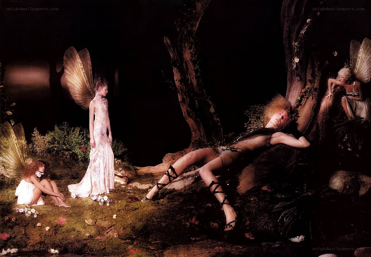 Fairy figures in a dark forest