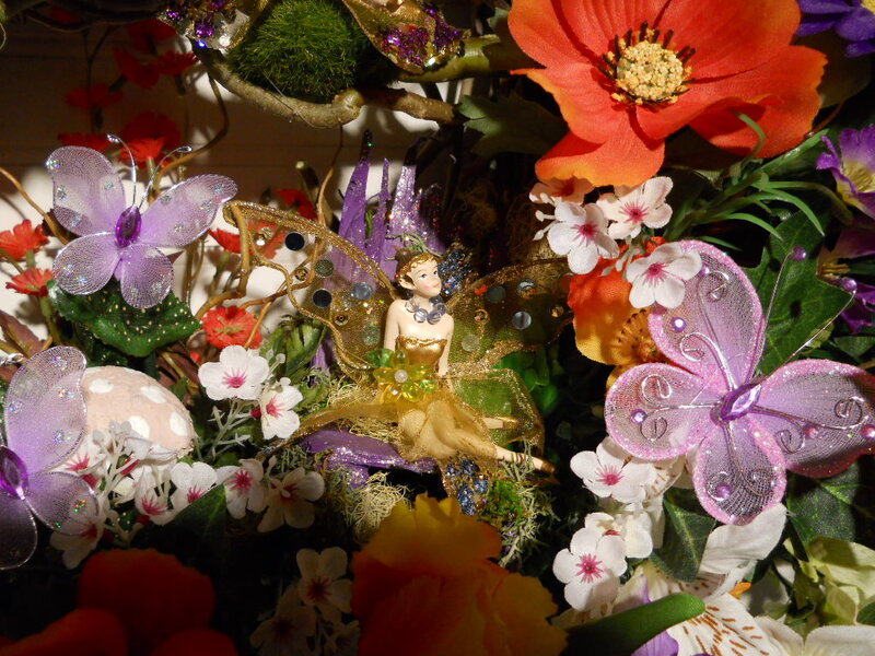 Fairy Figurine in Floral Arrangement