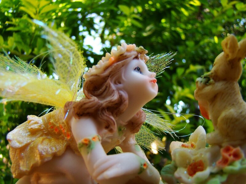 Fairy figurine in garden