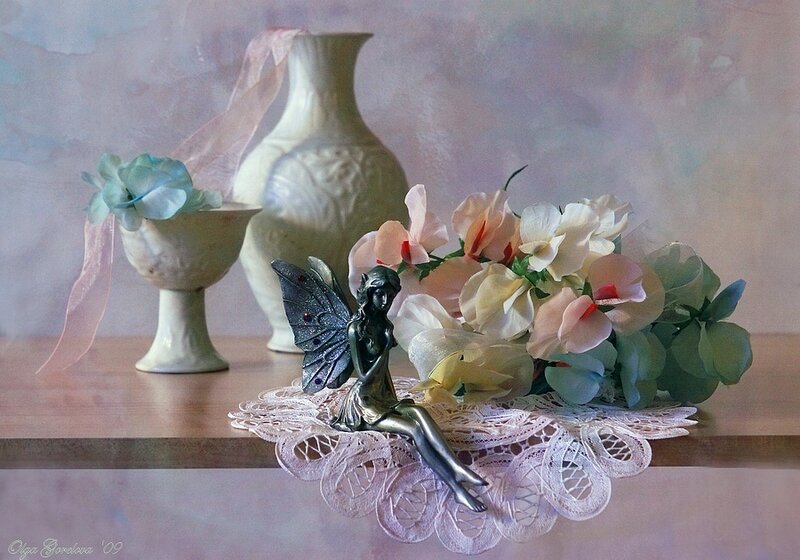 Fairy figurine with flowers