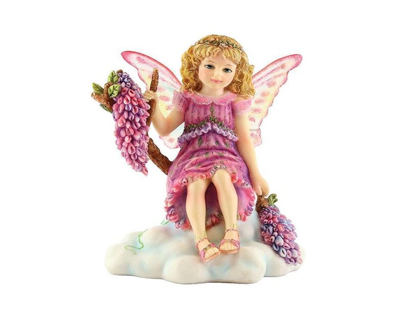 fairy figurine with flowers