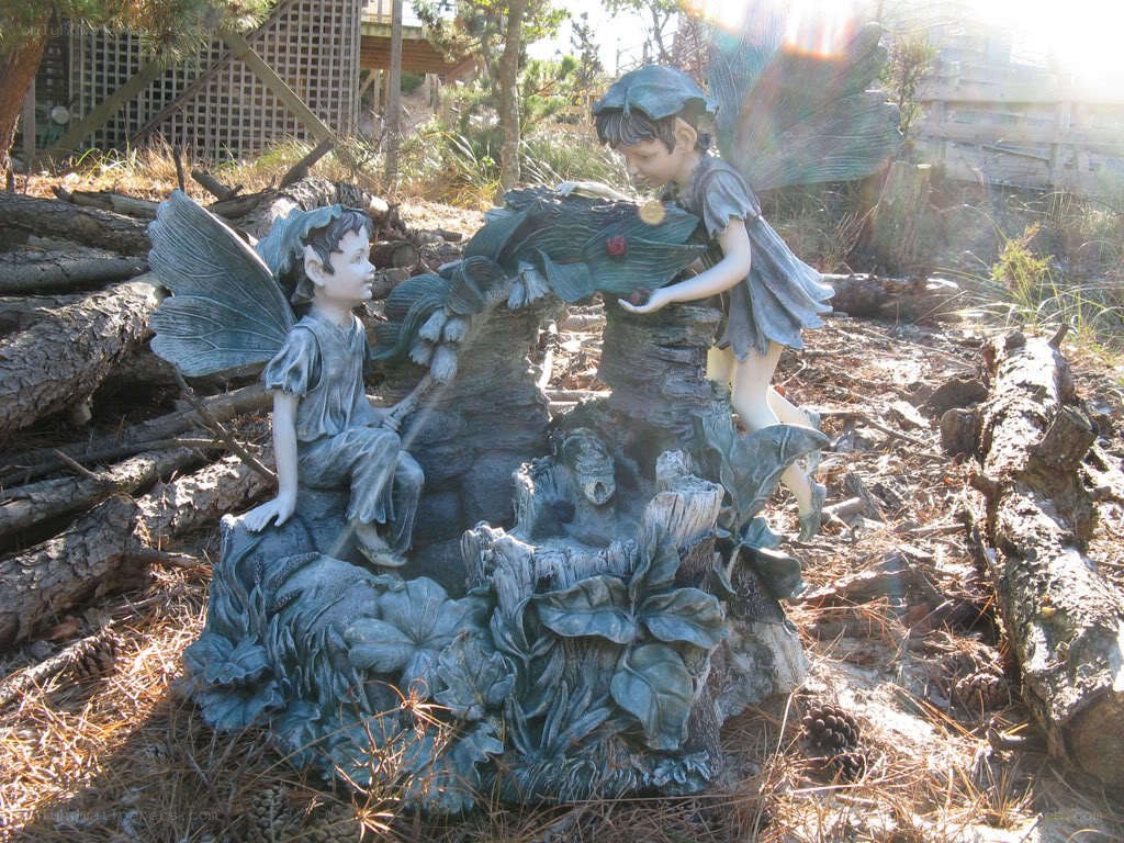 fairy garden statue in forest