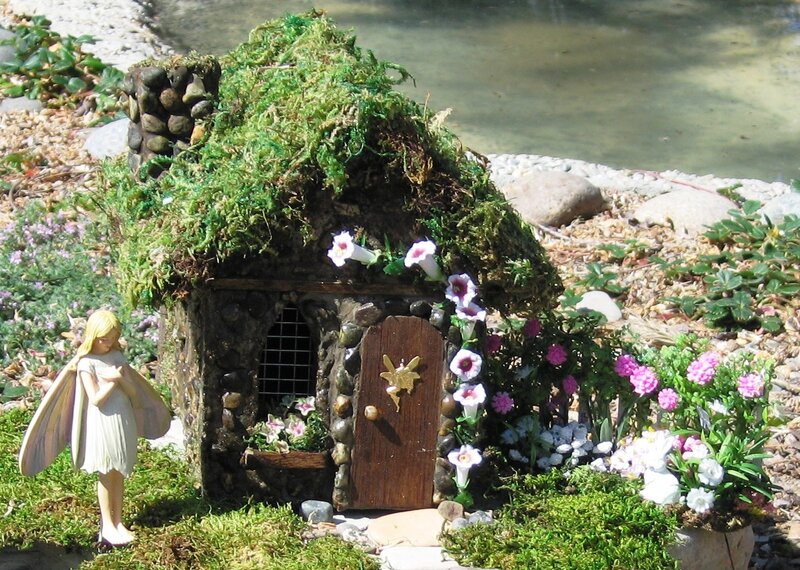 Fairy garden with miniature house