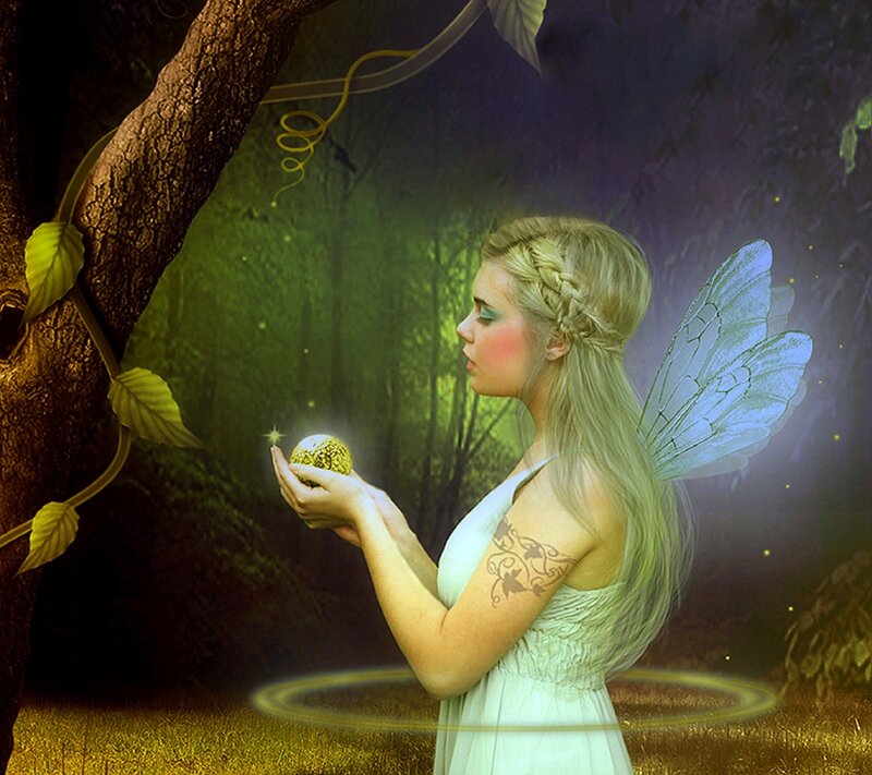 Fairy Holding Golden Orb