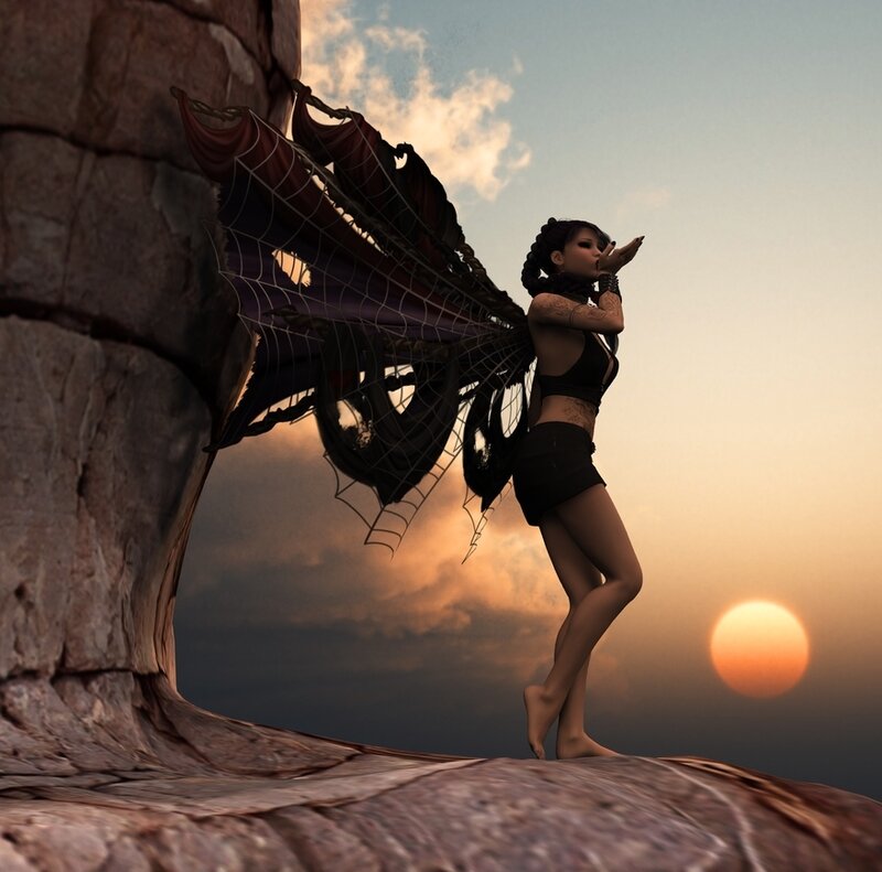 fairy on a cliff at sunset