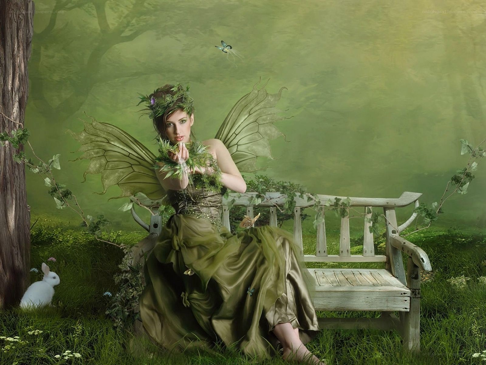 Fairy on a garden bench