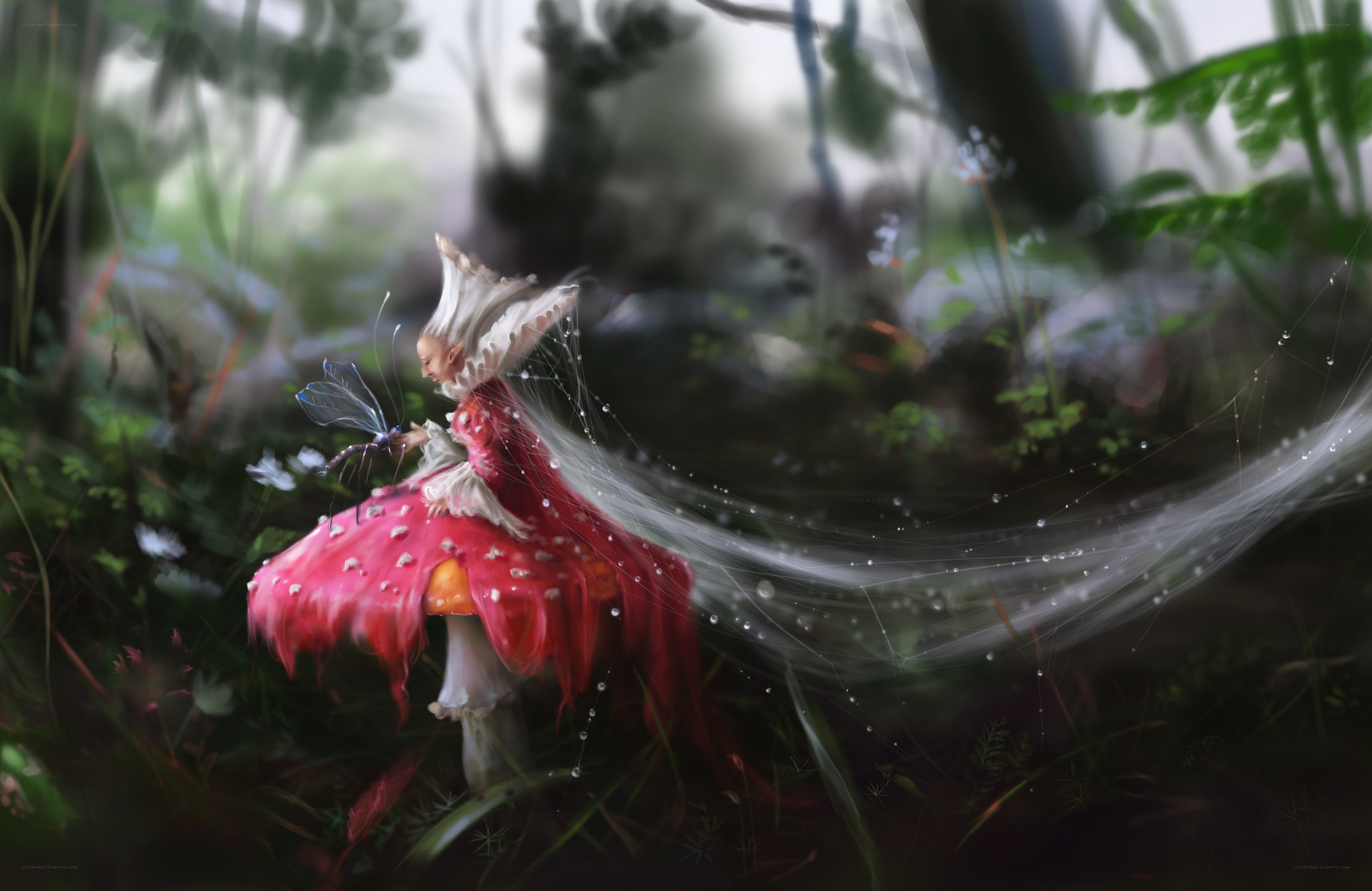fairy on a mushroom in forest