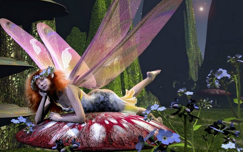 Fairy resting on a mushroom