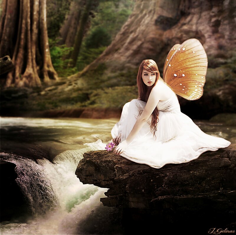 Fairy Sitting on Rock — White