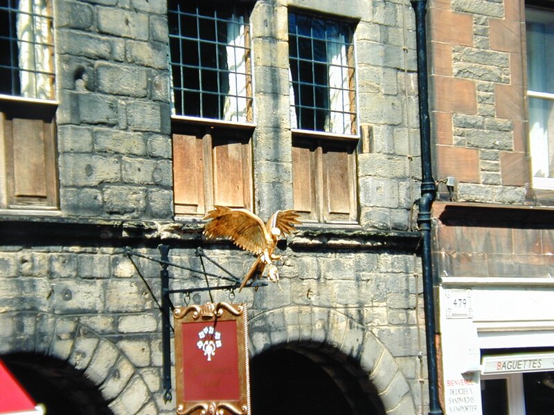 Falcon sculpture on stone building
