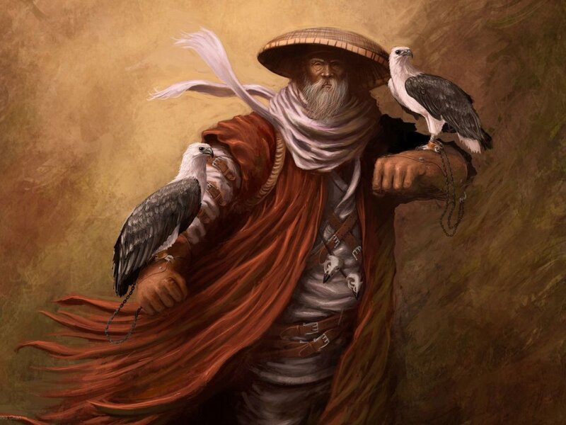 Falconer with two birds