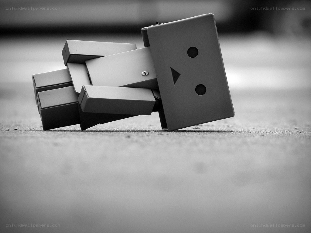 fallen cardboard robot figure