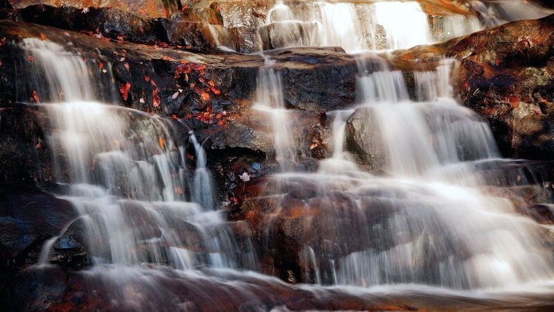 Falling Water over Rocks — Brown