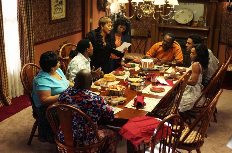 Family at Dinner Table — Brown