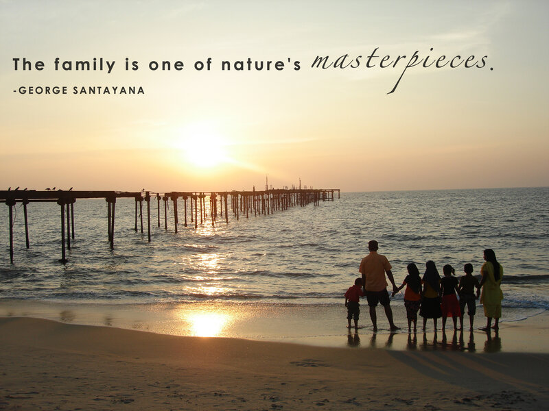 Family at sunset on the beach