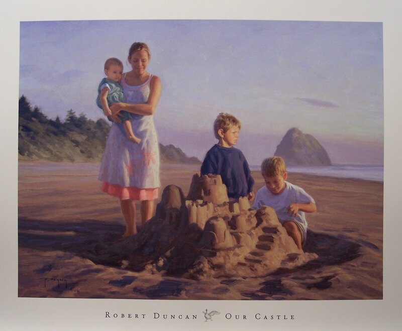 Family at the beach building a sandcastle