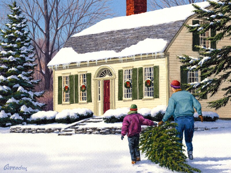Family carrying Christmas tree