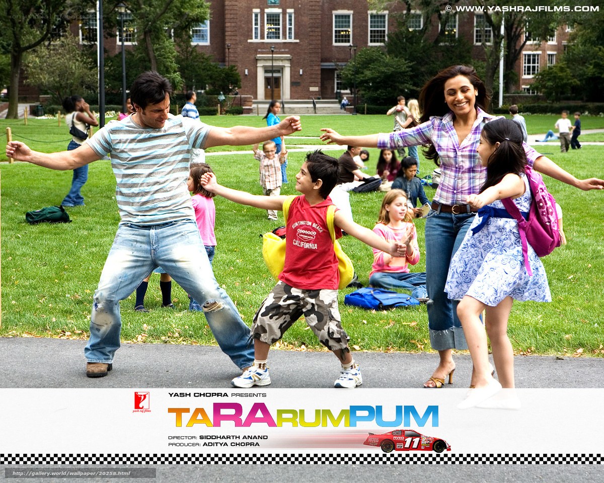 Family dancing in park