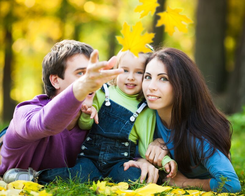 Family enjoying autumn in the park