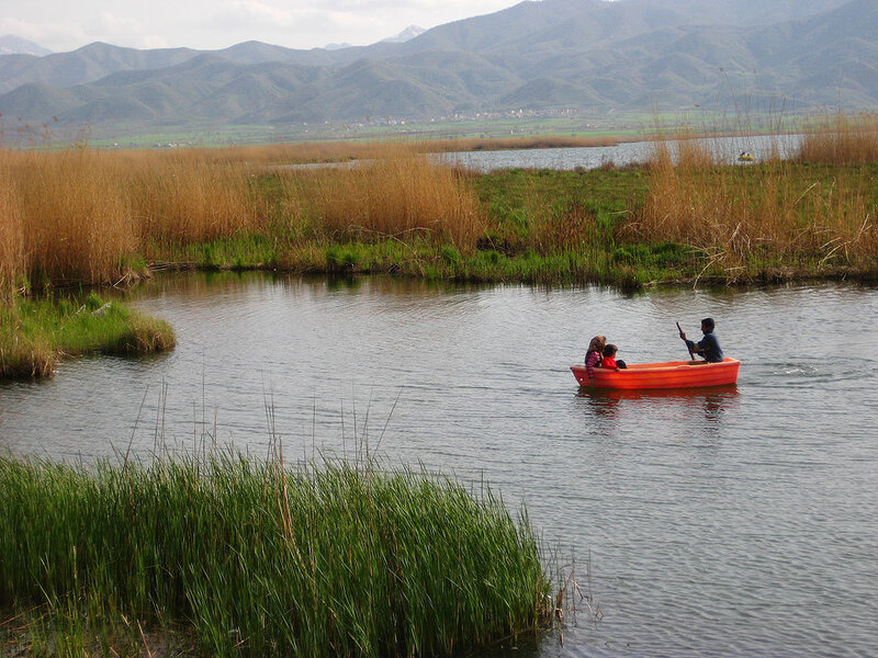 Family in a boat on a lake