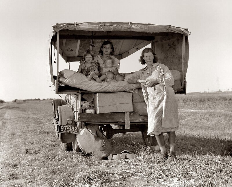 Family in a covered truck