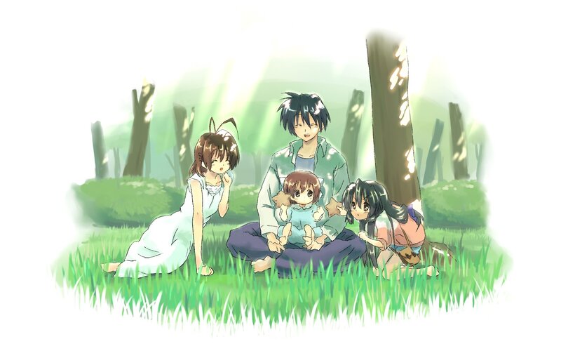 family in a sunlit forest