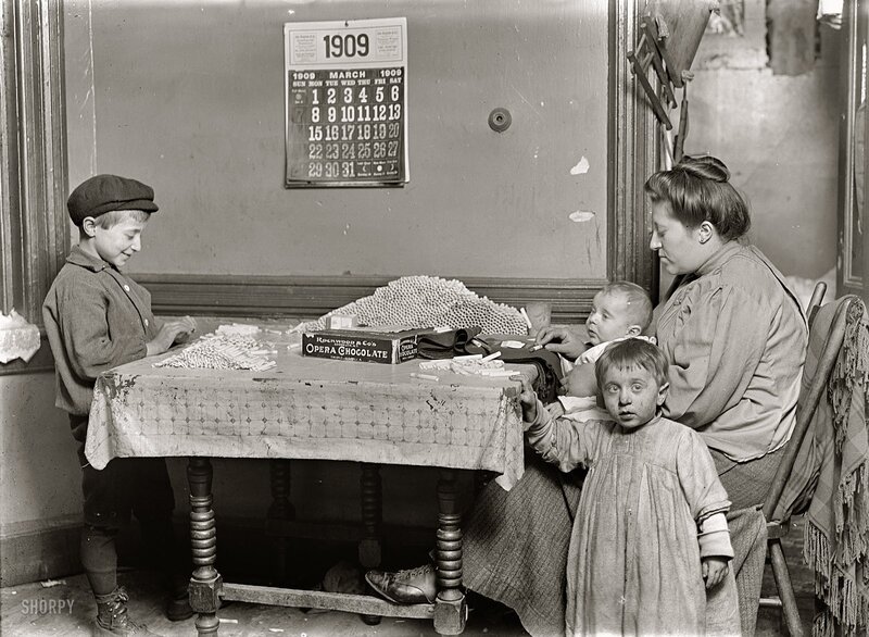 Family in a tenement room