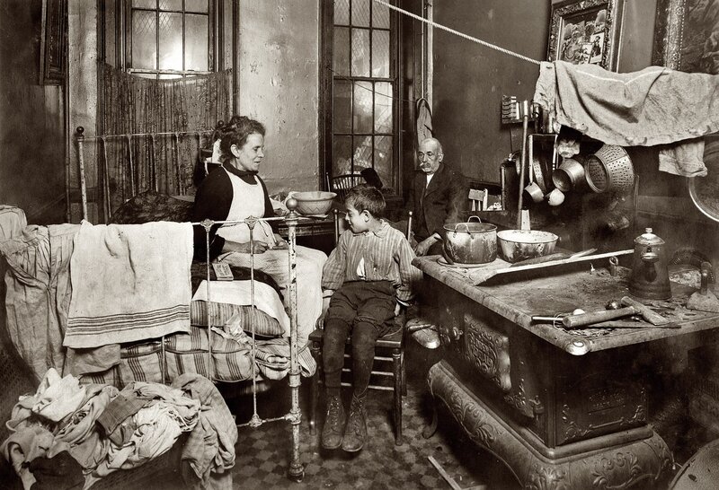 Family in a tenement room