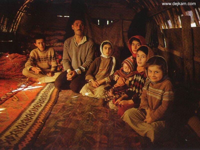 Family in a traditional dwelling