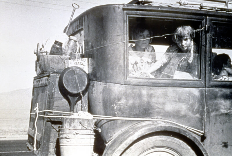 Family in a vintage car