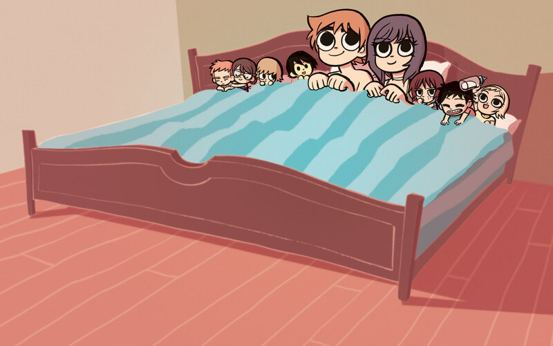 family in bed together