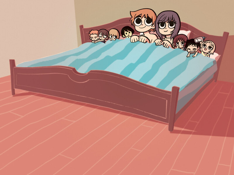 Family in bed together