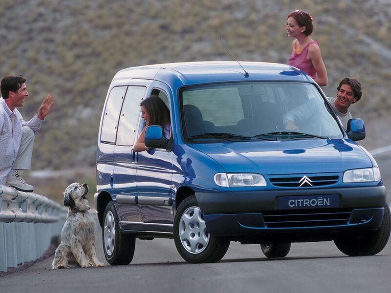 Family in blue Citroën van