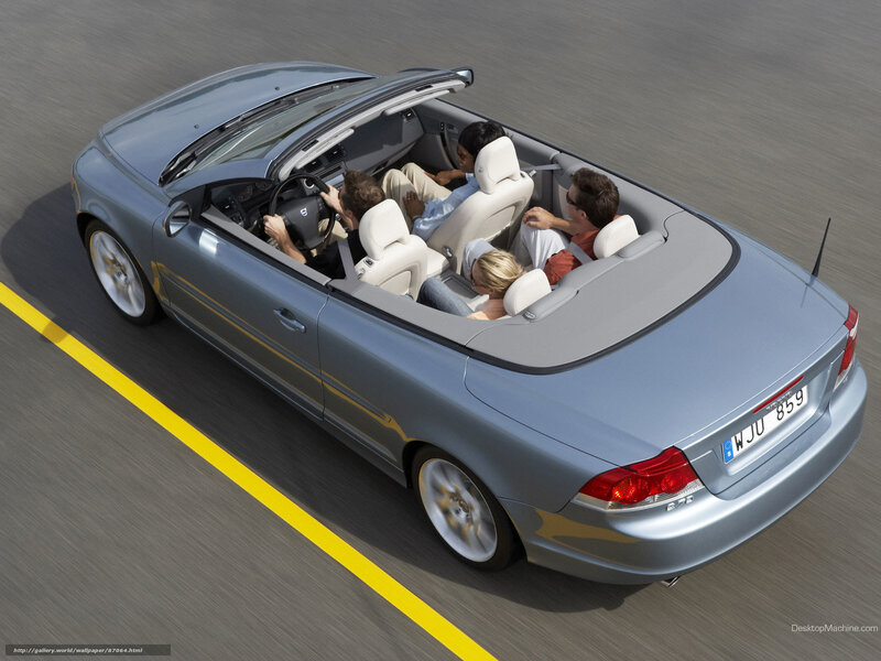 Family in convertible car