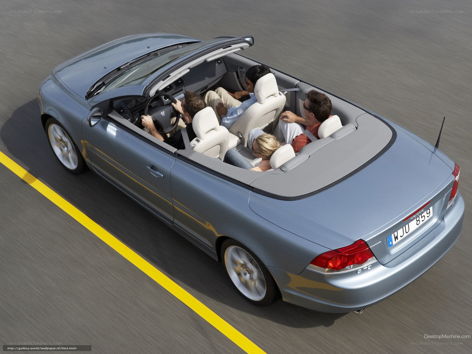 Family in convertible car